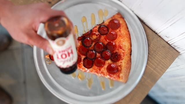 Mike's Hot Honey, America's #1 Brand of Hot Honey, Spicy Honey Infused with Chili Peppers, Certified Kosher, Gluten-Free, Paleo-Friendly, Sweet Heat, Perfect for Hot Sauce Lovers (10oz Bottle, 1 Pack)