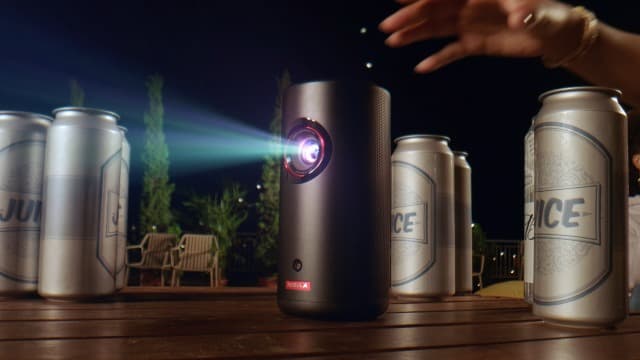 NEBULA Capsule 3 Laser Projector, Upgraded with Google TV and Official Netflix, Mini Smart TV Projector with Wi-Fi, Outdoor Portable Projector, Dolby Digital, 120-Inch Screen, 2.5H Built-In Battery