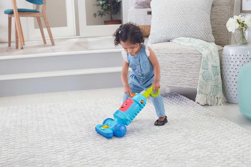 Fisher-Price Toddler Toy Laugh & Learn Light-Up Learning Vacuum Musical Push Along for Pretend Play Infants Ages 1+ Years​