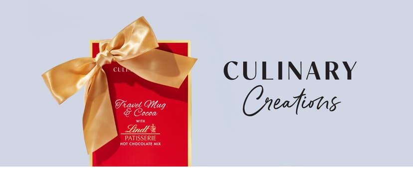 Travel Mug and Hot Cocoa Set, Includes Lindt Gourmet Hot Chocolate Mix and Ceramic Travel Tumbler with Lid in a Giftable Box, Great for Christmas